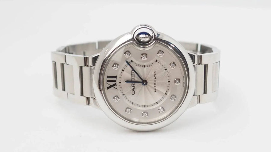 Montre Ballon Bleu Cartier automatique en acier et diamants