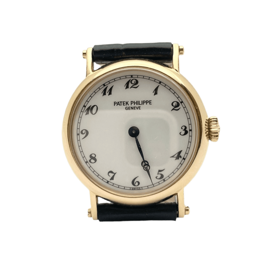 Montre PATEK PHILIPPE en or rose, cuir et porcelaine