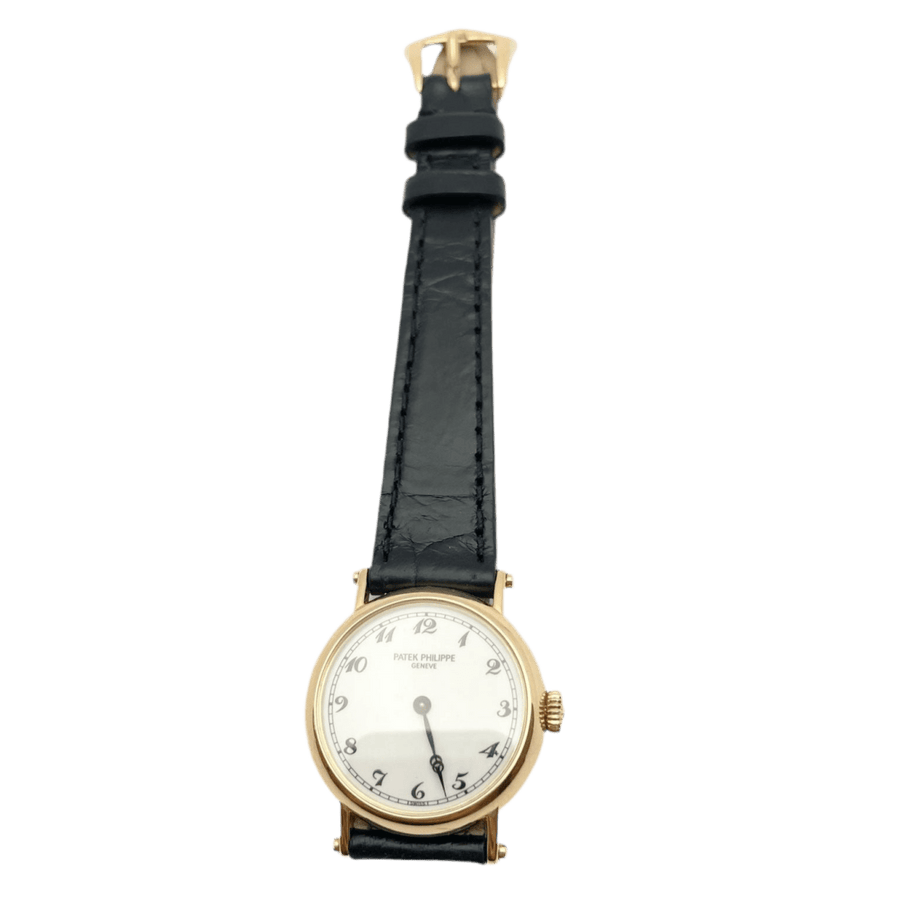 Montre PATEK PHILIPPE en or rose, cuir et porcelaine