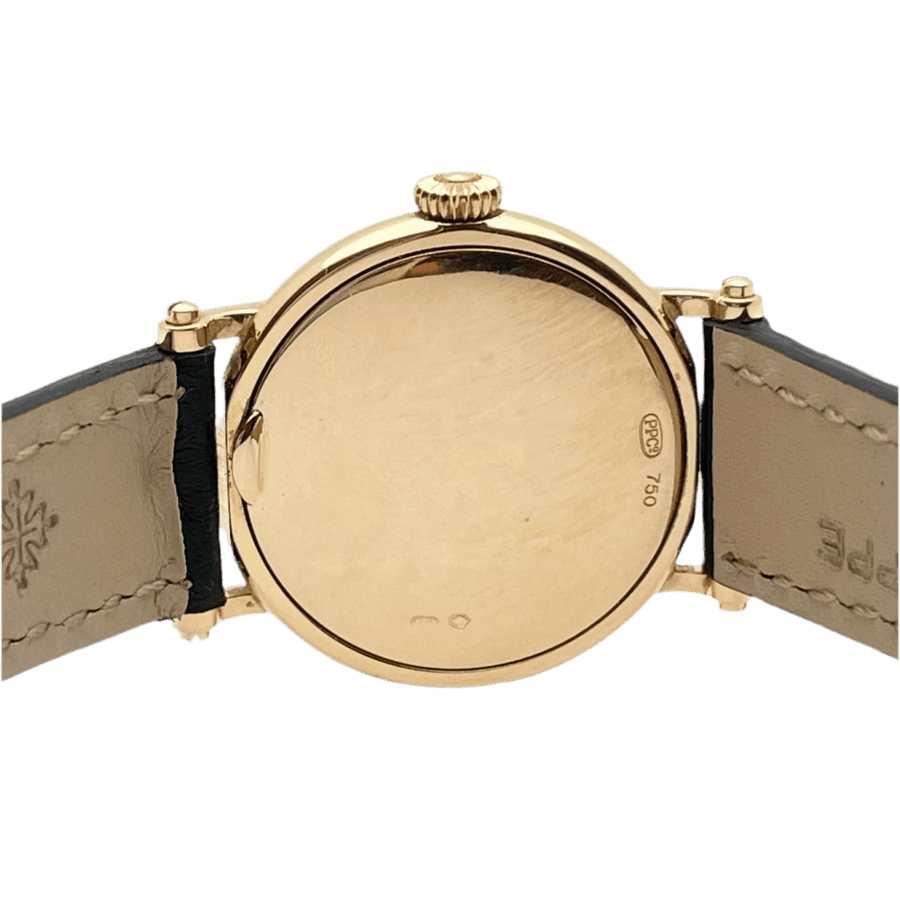 Montre PATEK PHILIPPE en or rose, cuir et porcelaine
